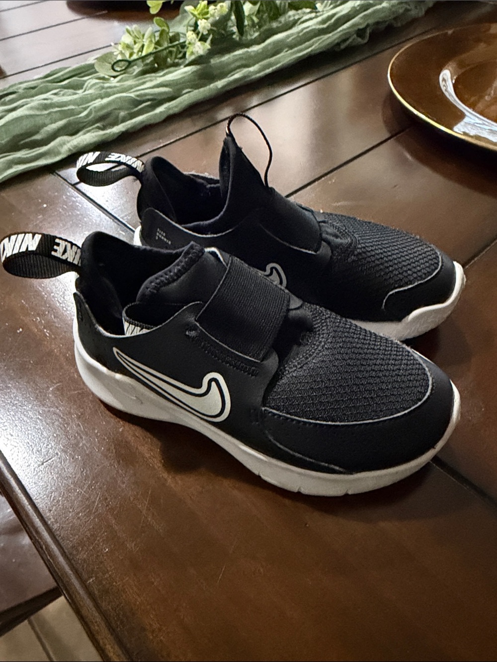 Nike Kids Black and White Slip-On Sneakers